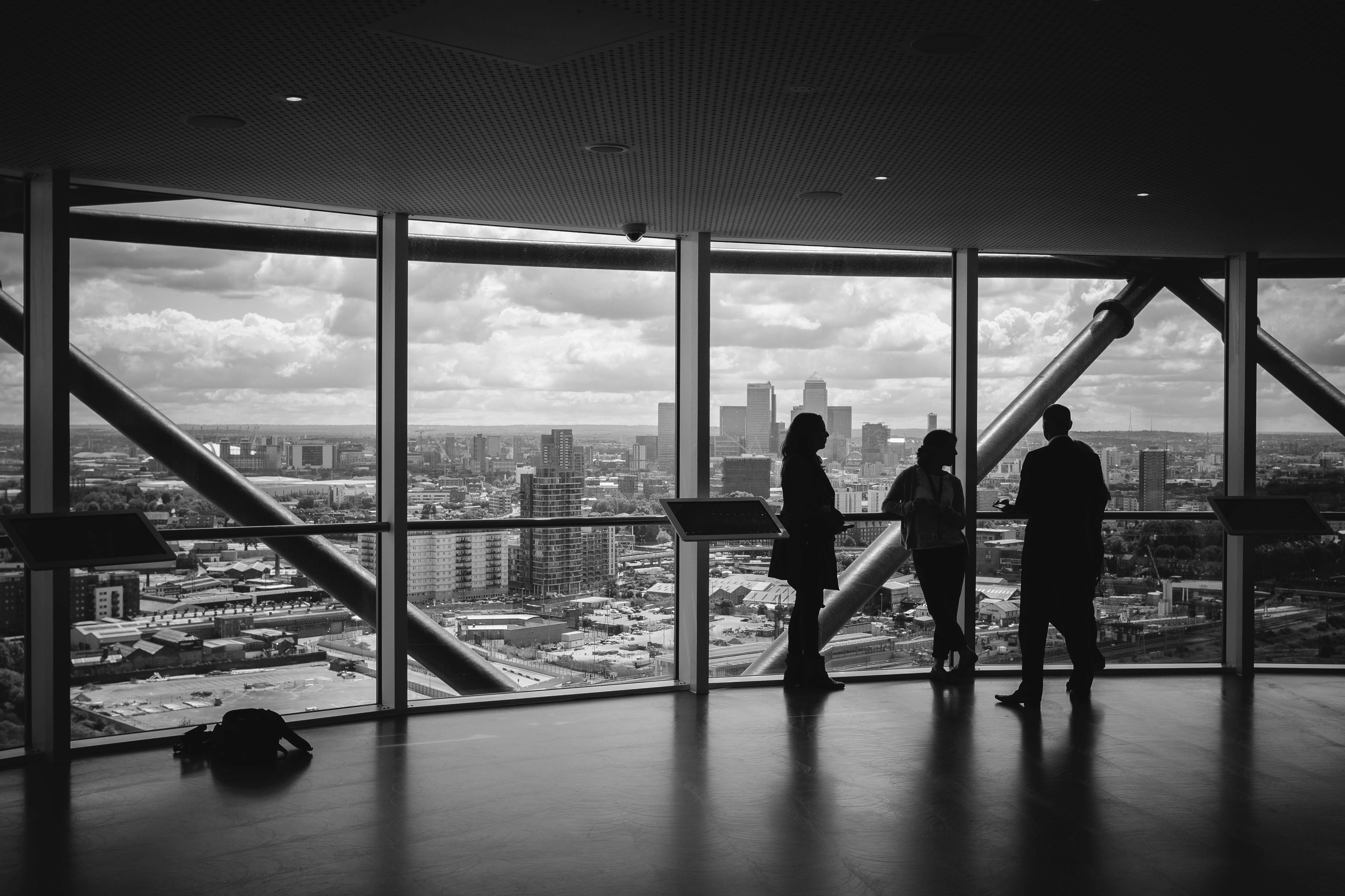 Business colleagues in a tall building