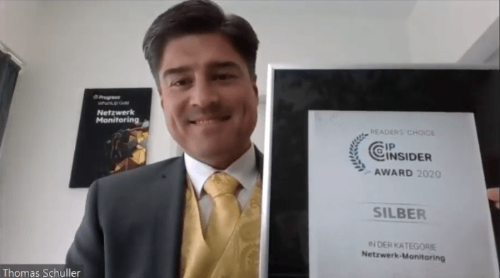Thomas Schuller of Progress accepts the award win for Progress WhatsUp Gold