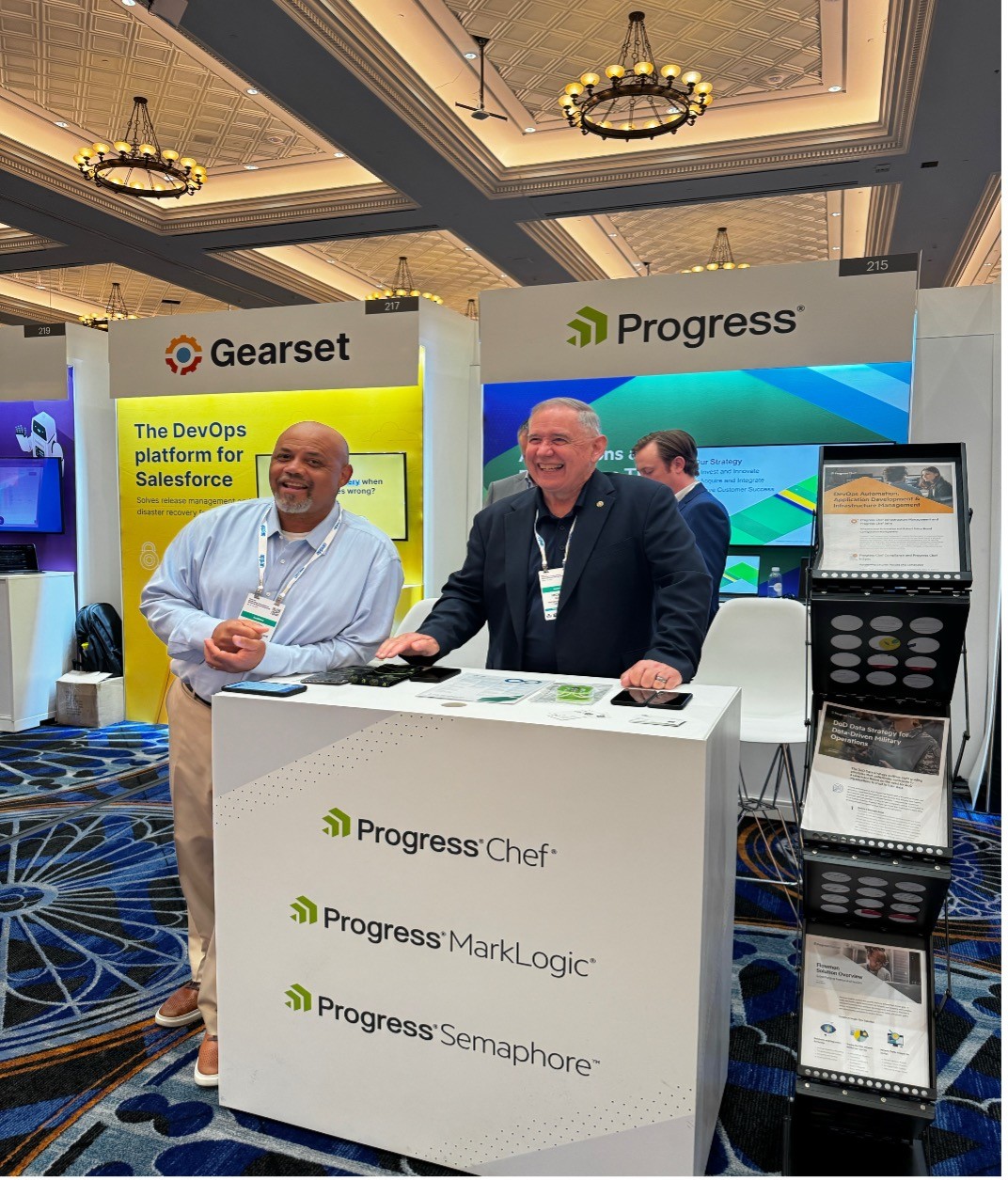 Two reps at the Progress booth at the Gartner Conference