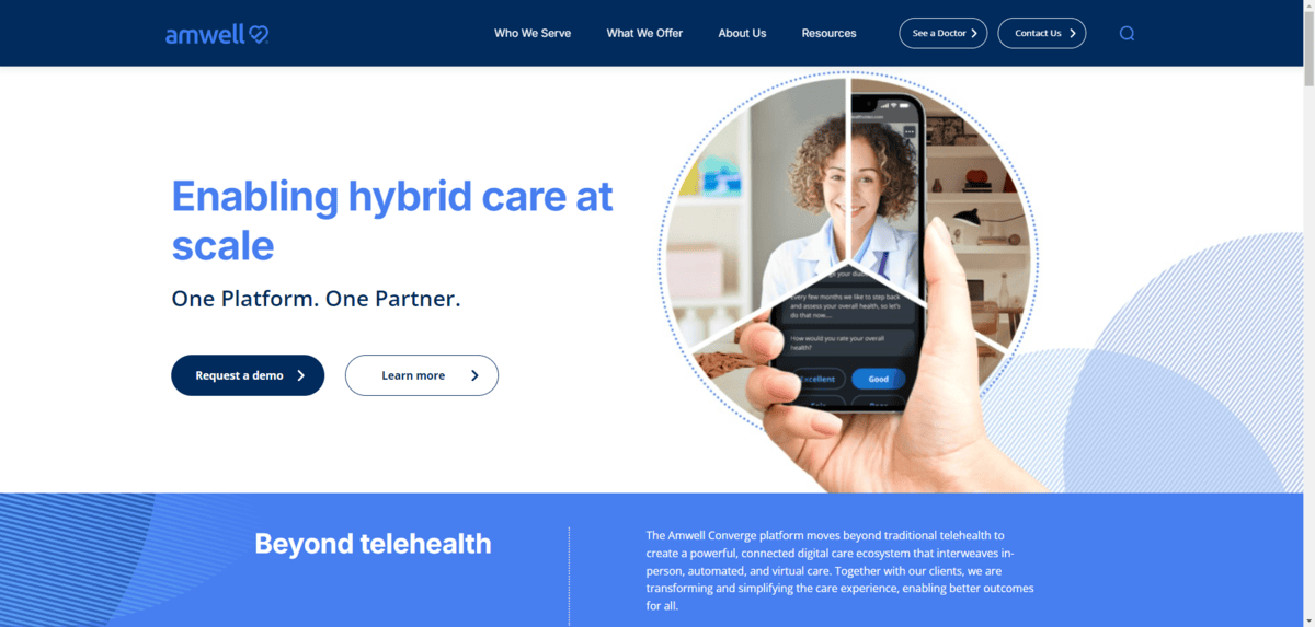 A screenshot of the Amwell homepage hero section. The background is white. On top is blue text that reads “Enabling hybrid care at scale” as well as “One Platform. One Partner.” There are two buttons beneath this text as well as an image on the right. To the bottom-right of the image are two intersecting blue shapes.