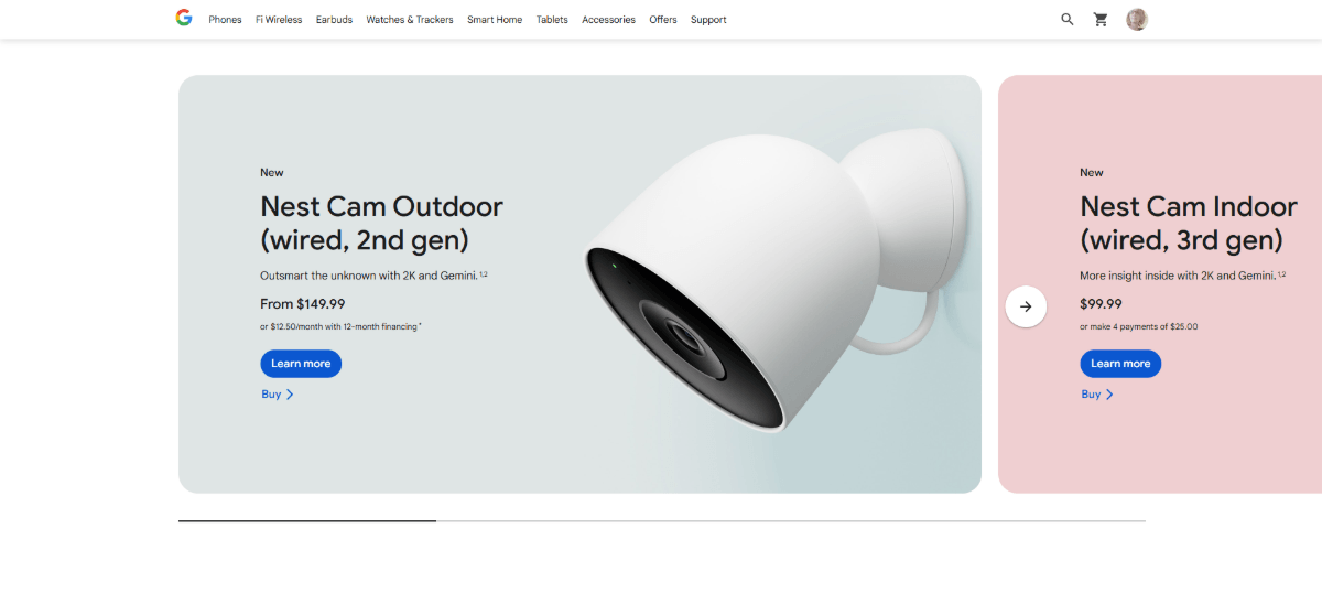 A screenshot from the Google Store page for Nest. In this section, there are two Nest Cam products advertised in a carousel. To the left of the outdoor camera product is white space that fills the page margin. To the right is part of the indoor camera product block which extends to the edge of the page.