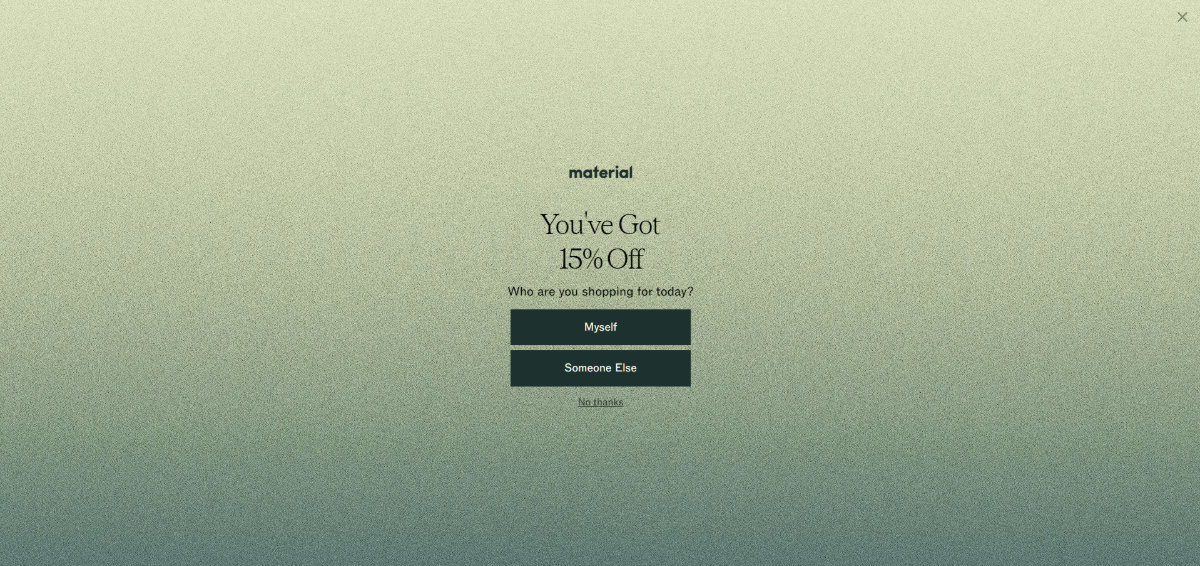 A screenshot of the fullscreen popup that appears on the Material Kitchen website. The screen has a grainy yellow-green gradient background. In the center is a message that reads “You’ve Got 15% Off”. The user is asked to answer “Who are you shopping for today?” with the answers being “Myself”, “Someone Else” and “No thanks”.