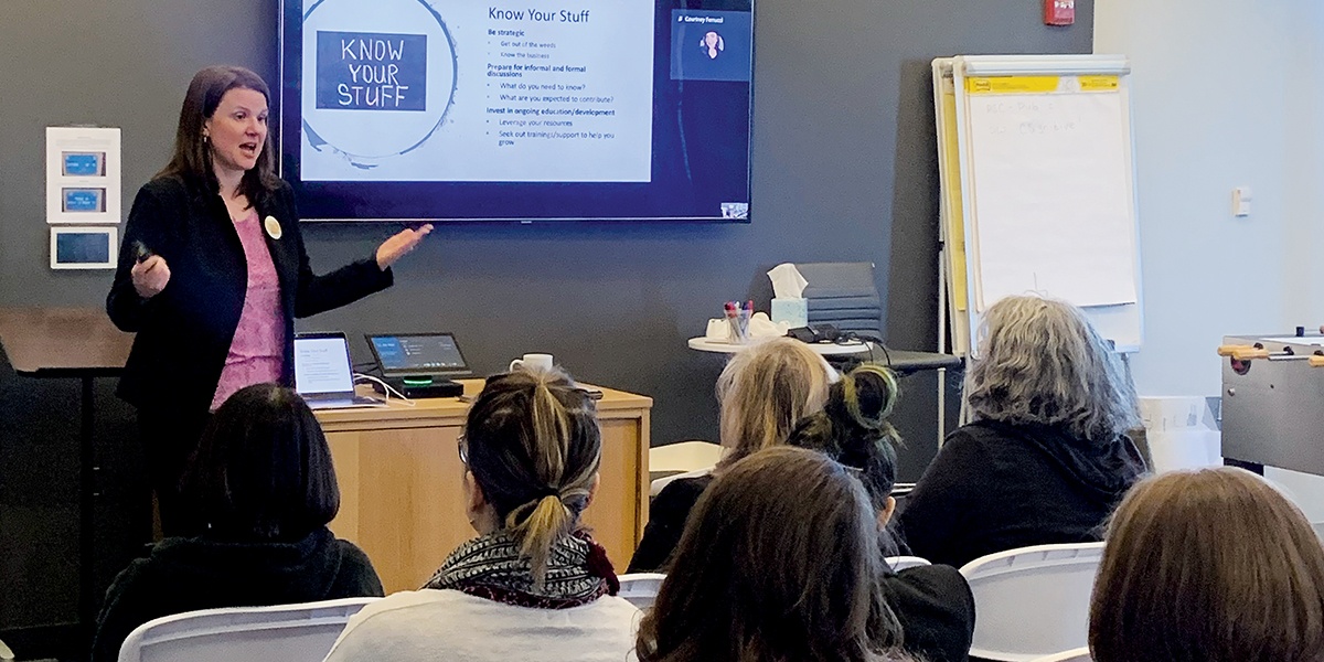 Women’s leadership executive consultant Kim Meninger speaks at a Progress for Her event at the Burlington office of Progress in March.